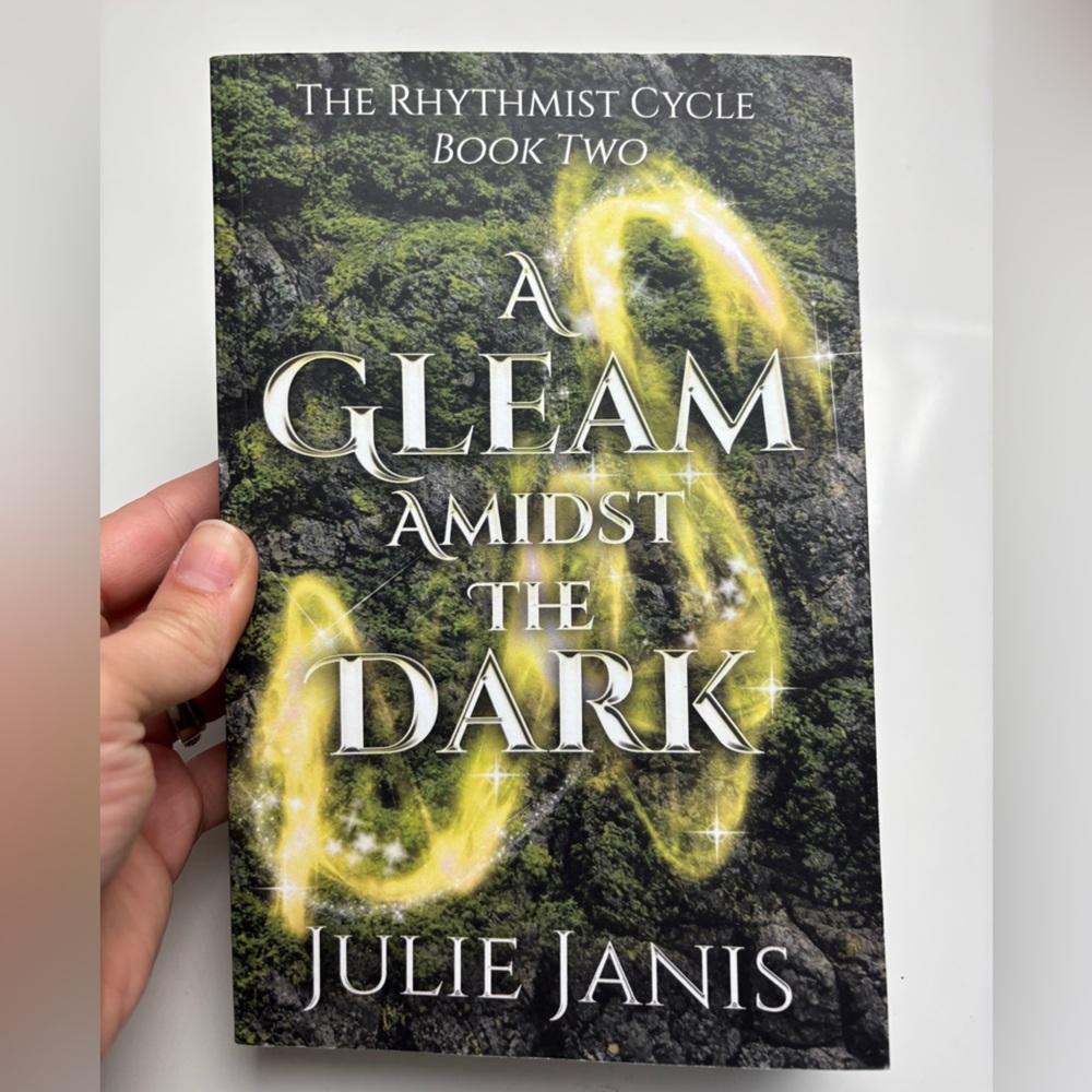 A Gleam Amidst the Dark Paperback book by Julie Janis